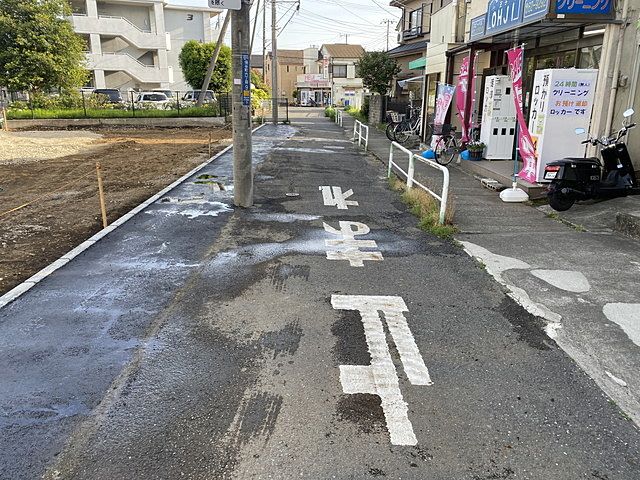 セットバック部分のアスファルト舗装が完了した西東京市保谷町の現地2（2022.4.25）スプラッシュ